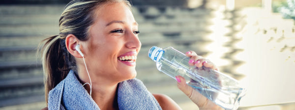 Sports drinks vs water for athletes post-exercise hydration guide.