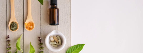 Multivitamin capsules and fruits representing a balanced diet for women's health. 