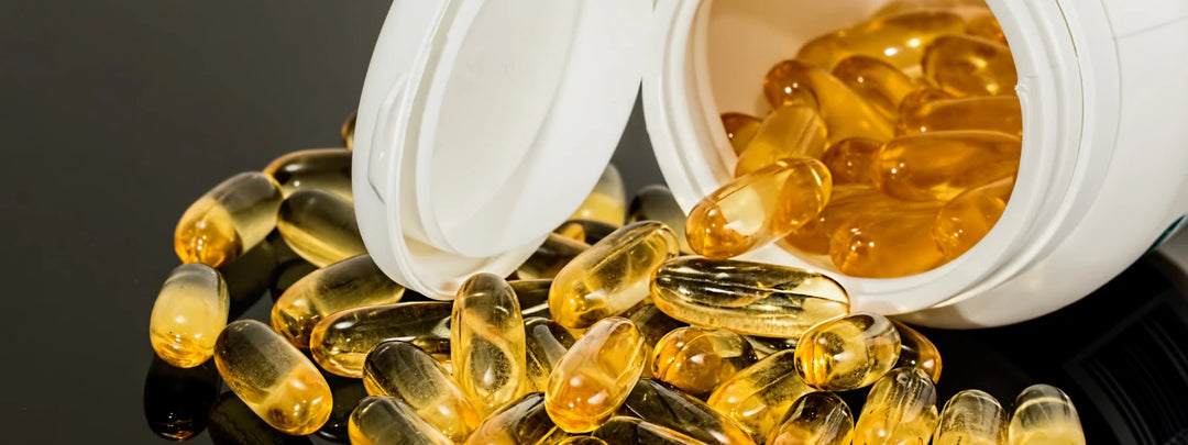 Various supplements to improve gut health, including probiotics and prebiotics, on a clean surface. 