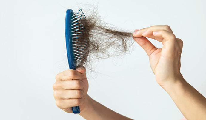 Here's How Stress Causes Hair Loss
